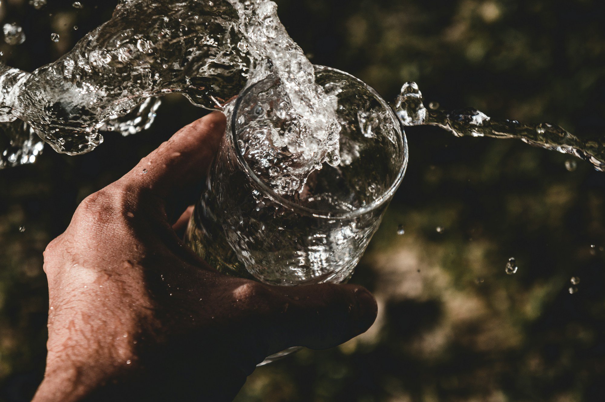 PFAS... Again! 1 person holding drinking glass filled with water